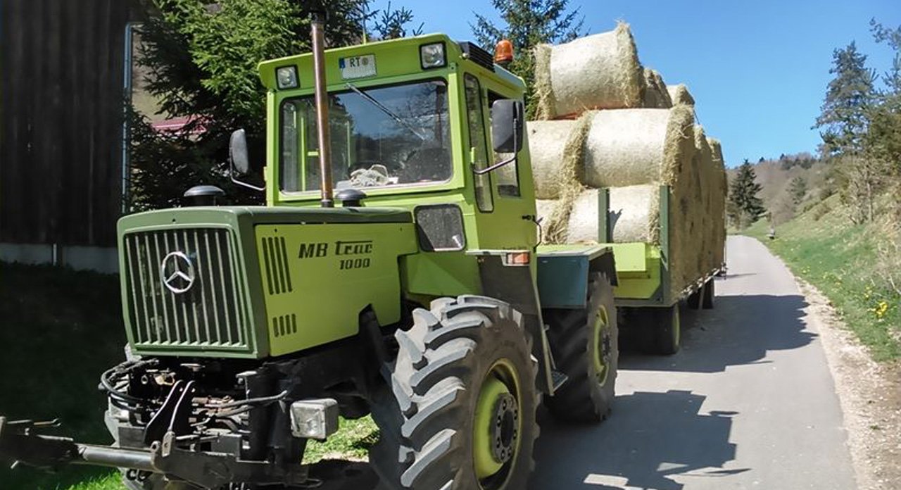 Transporte von Holz, Heu, Stroh, Ballen aller Art mit Tieflader